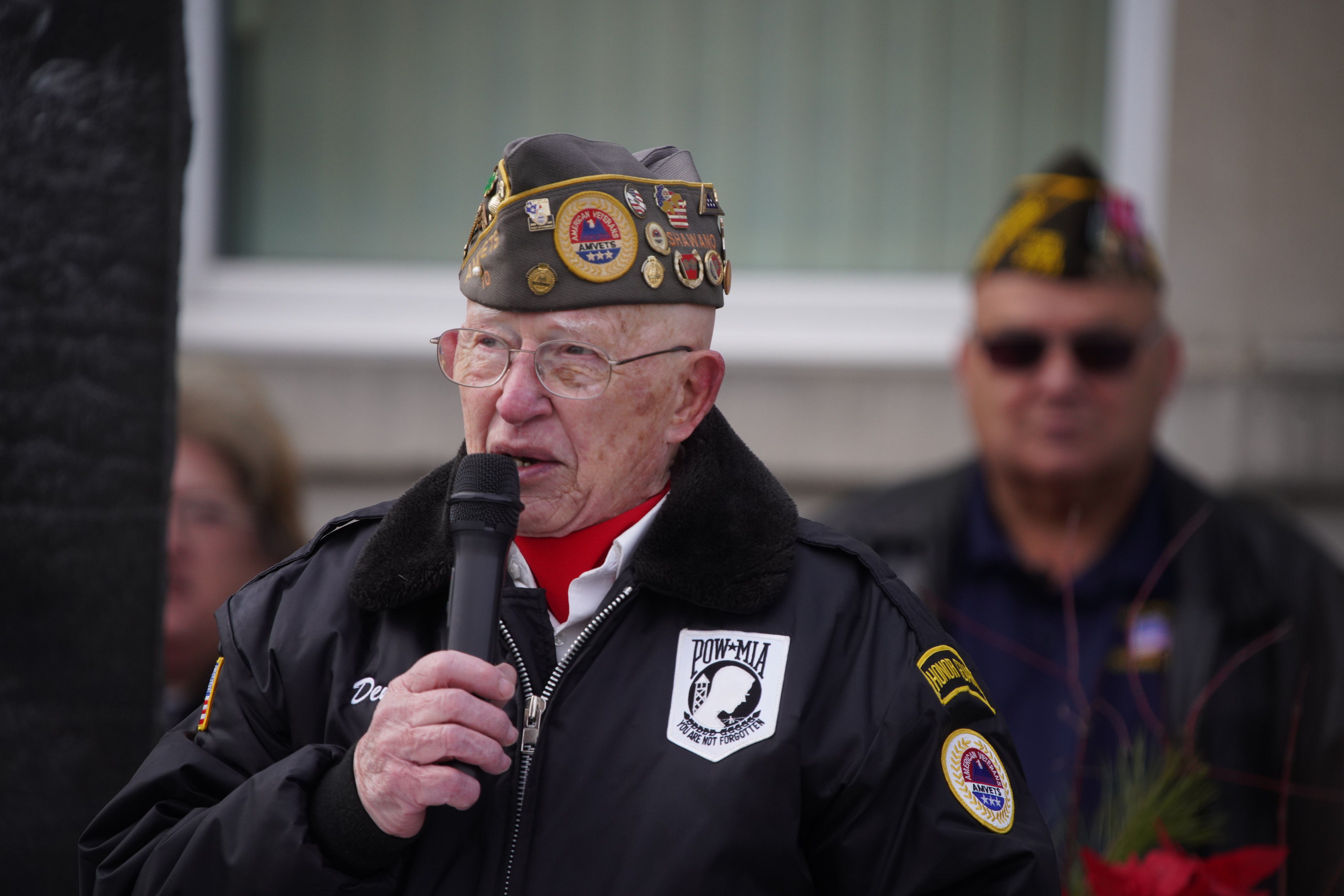 Dennis Bohm welcomes a crowd of more than 100 to the Shawano Veterans Day ceremony Nov. 11. (Greg Mellis | NEW Media)