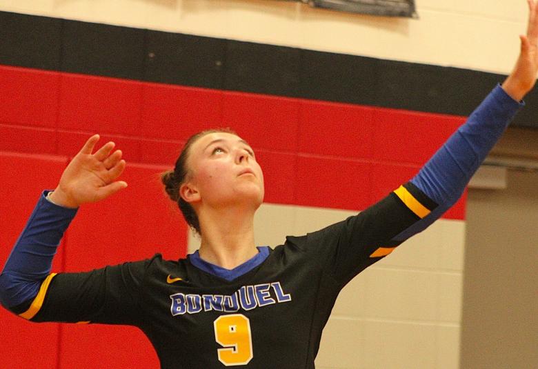 Juliana Jacobs keeps her eyes on the ball while serving for Bonduel.  (Greg Seubert)
